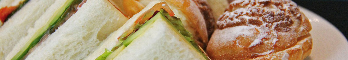 Eating Sandwich at Brooklyn Bagel Bakery restaurant in Arlington, VA.